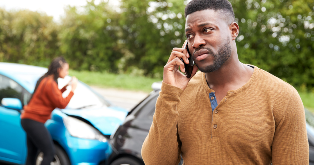 man on phone after a car accident