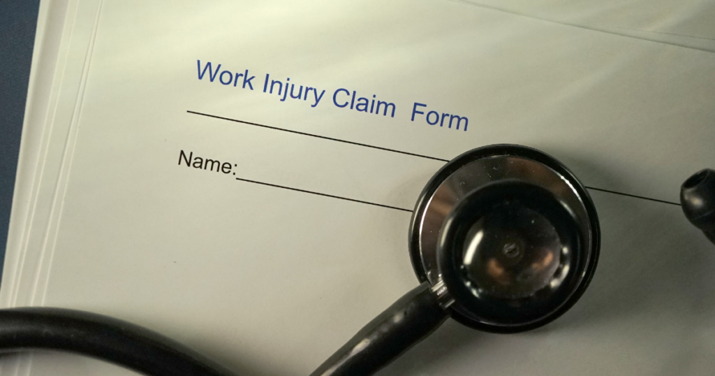 stethoscope on work injury claim form