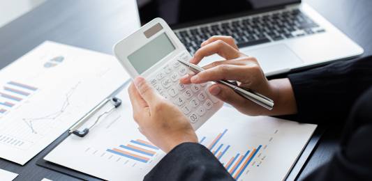 Person Using Calculator